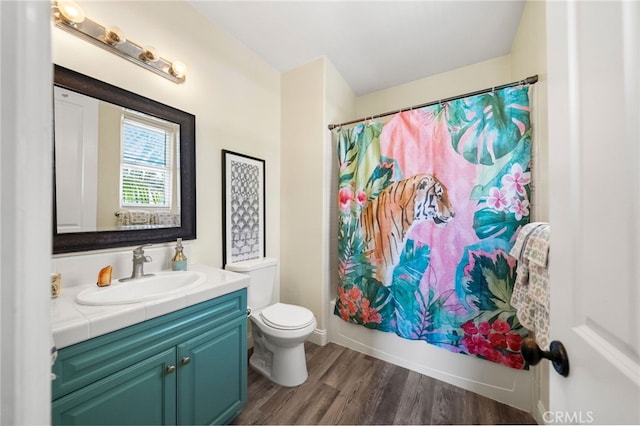 982 Camino Del Arroyo Dr Unit 49, San Marcos, CA 92078 - full bathroom with vanity, wood finished floors, and shower / bath combination with curtain