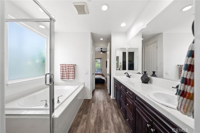 982 Camino Del Arroyo Dr Unit 49, San Marcos, CA 92078 - ensuite bathroom featuring a bath, double vanity, ceiling fan, a shower stall, and recessed lighting