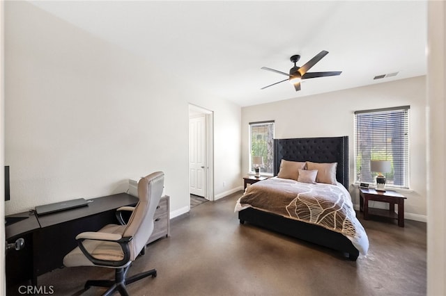 982 Camino Del Arroyo Dr Unit 49, San Marcos, CA 92078 - bedroom featuring a desk, finished concrete flooring, and a ceiling fan