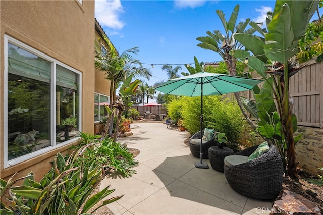 982 Camino Del Arroyo Dr Unit 49, San Marcos, CA 92078 - fenced backyard with a patio
