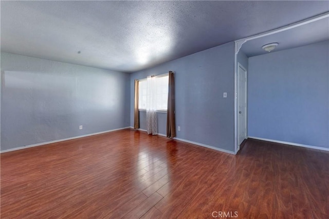 8933 Locust Ave, Fontana, CA 92335 - empty room featuring wood finished floors and a textured ceiling