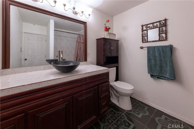 8933 Locust Ave, Fontana, CA 92335 - full bathroom featuring vanity, tile patterned flooring, and a shower with curtain