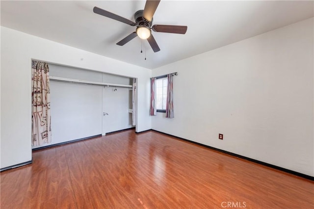 8933 Locust Ave, Fontana, CA 92335 - unfurnished bedroom featuring wood finished floors, a closet, and ceiling fan