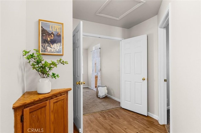 1057 Windsor Way, Chico, CA 95926 - corridor with attic access and light wood finished floors