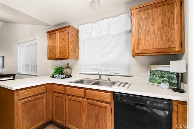 1057 Windsor Way, Chico, CA 95926 - kitchen with dishwasher, a peninsula, light countertops, vaulted ceiling, and brown cabinetry