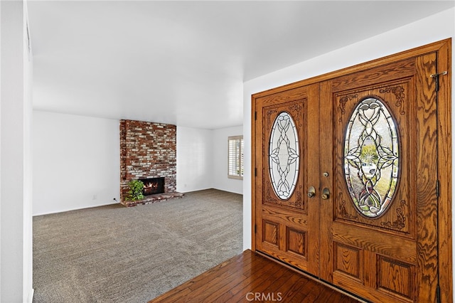 24802 La Plata Dr, Laguna Niguel, CA 92677 - entryway featuring a brick fireplace