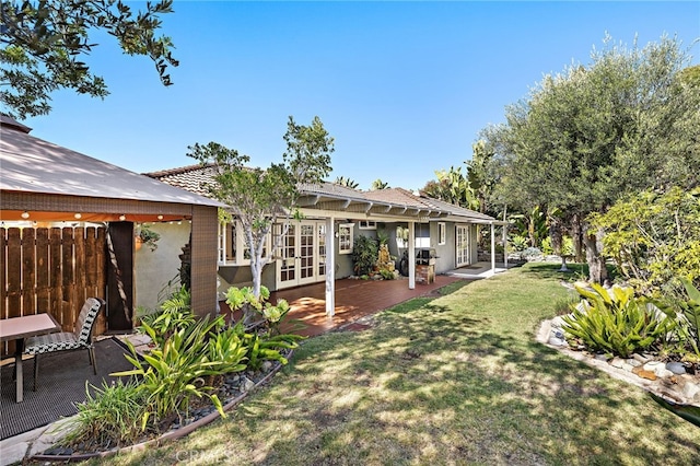 24802 La Plata Dr, Laguna Niguel, CA 92677 - view of grassy yard featuring french doors and a patio