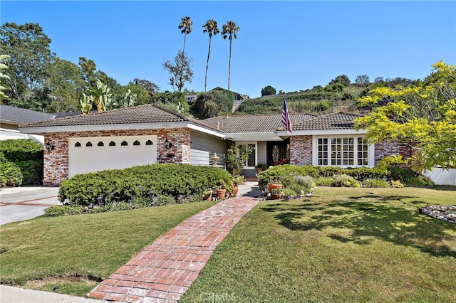 24802 La Plata Dr, Laguna Niguel, CA 92677 - ranch-style house featuring a tiled roof, a garage, a front yard, and brick siding