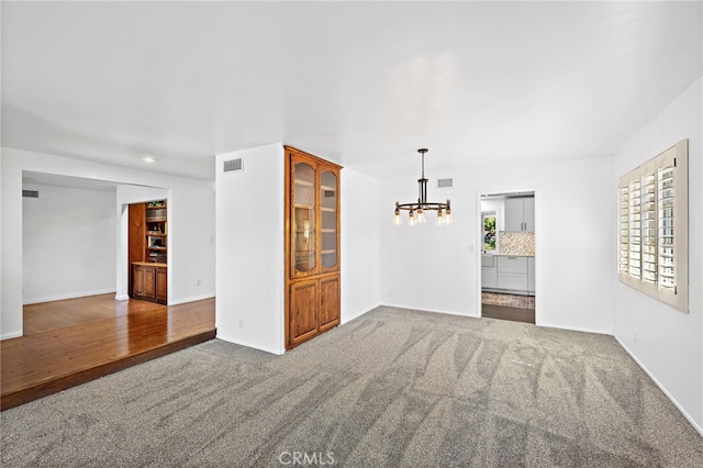 24802 La Plata Dr, Laguna Niguel, CA 92677 - unfurnished room with carpet floors and a chandelier