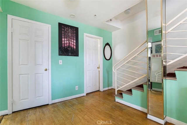 116 W Maple St Unit 25, Glendale, CA 91204 - entrance foyer with stairs and wood finished floors