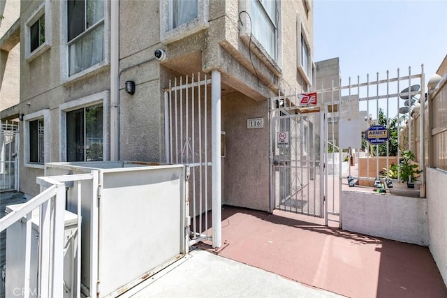 116 W Maple St Unit 25, Glendale, CA 91204 - property entrance with a gate and a surveillance system