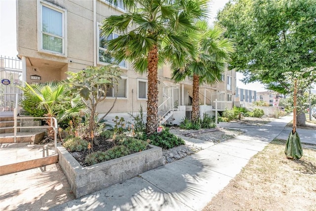 116 W Maple St Unit 25, Glendale, CA 91204 - view of front of home with stairs and stucco siding