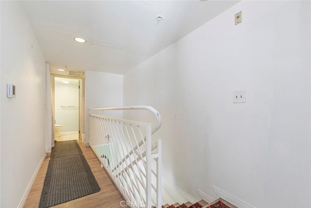 116 W Maple St Unit 25, Glendale, CA 91204 - corridor featuring light wood finished floors, an upstairs landing, and recessed lighting