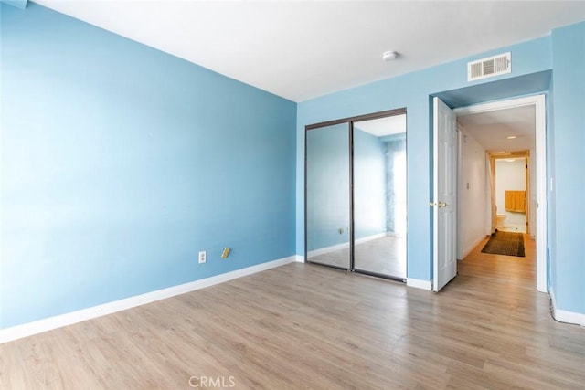 116 W Maple St Unit 25, Glendale, CA 91204 - unfurnished bedroom with light wood finished floors and a closet