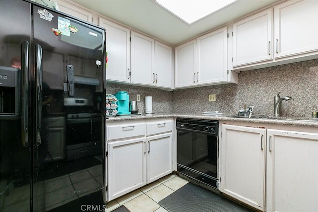 116 W Maple St Unit 25, Glendale, CA 91204 - kitchen featuring black appliances, light tile patterned floors, light countertops, tasteful backsplash, and white cabinets