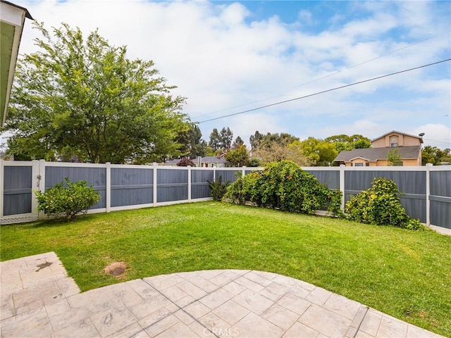 5243 E Monlaco Rd, Long Beach, CA 90808 - fenced backyard featuring a patio