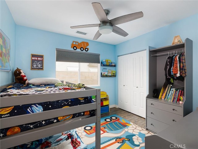 5243 E Monlaco Rd, Long Beach, CA 90808 - bedroom with wood finished floors, ceiling fan, and a closet