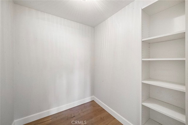 17842 Beard Ln Unit 88, Huntington Beach, CA 92647 - walk in closet with wood finished floors