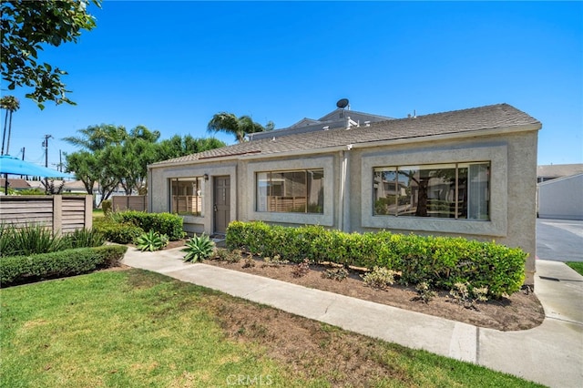 17842 Beard Ln Unit 88, Huntington Beach, CA 92647 - rear view of house with stucco siding