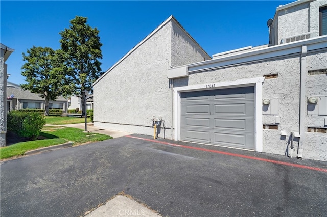 17842 Beard Ln Unit 88, Huntington Beach, CA 92647 - garage featuring driveway