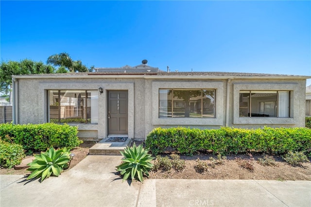 17842 Beard Ln Unit 88, Huntington Beach, CA 92647 - view of front of house with stucco siding