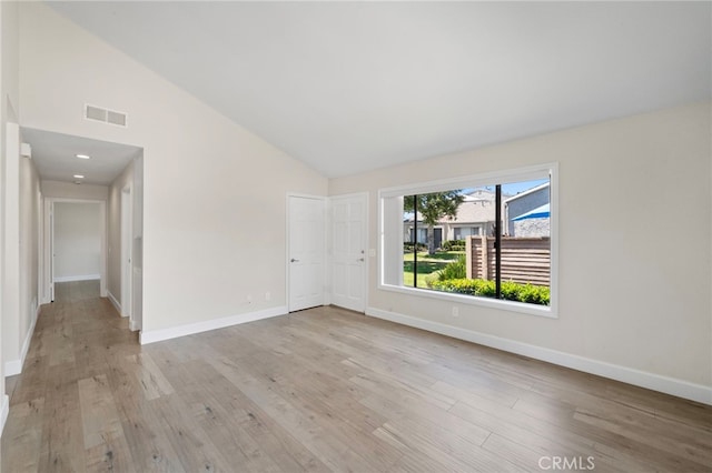 17842 Beard Ln Unit 88, Huntington Beach, CA 92647 - unfurnished room featuring light wood-type flooring and high vaulted ceiling