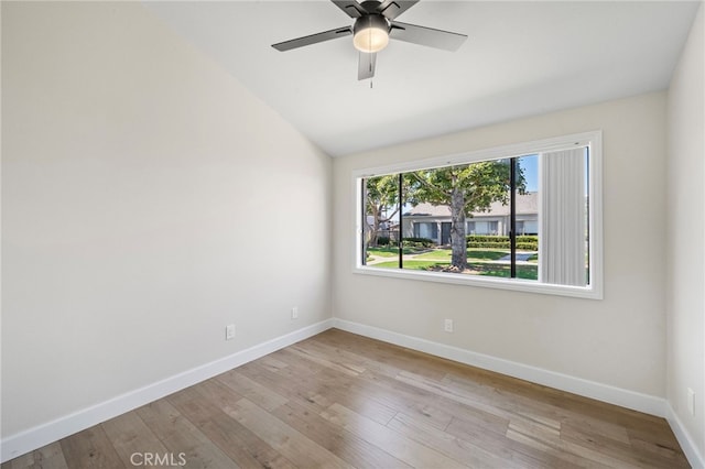 17842 Beard Ln Unit 88, Huntington Beach, CA 92647 - unfurnished room featuring wood finished floors, lofted ceiling, and a ceiling fan