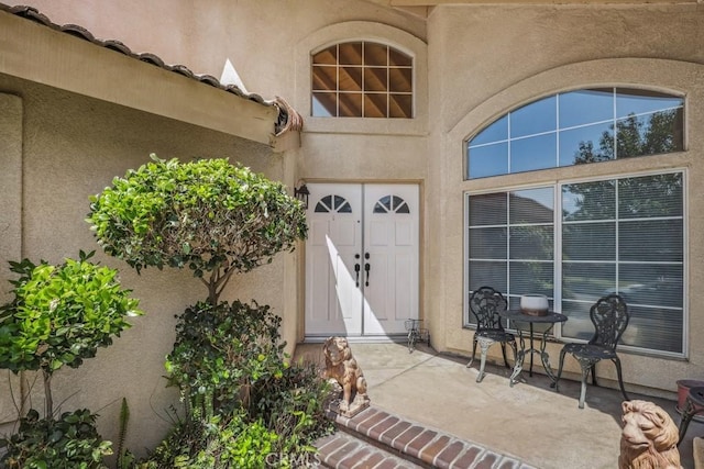 14226 Remington Ct, Fontana, CA 92336 - doorway to property with stucco siding