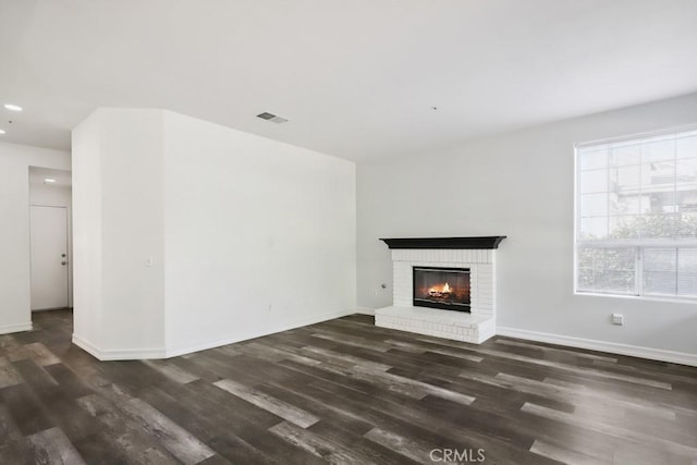 14226 Remington Ct, Fontana, CA 92336 - unfurnished living room featuring wood finished floors, a fireplace, and recessed lighting