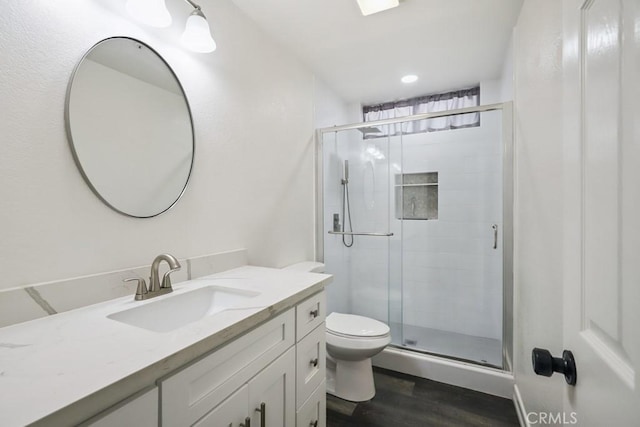 14226 Remington Ct, Fontana, CA 92336 - full bath with wood finished floors, a shower stall, and vanity