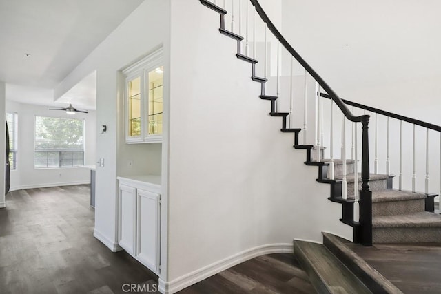 14226 Remington Ct, Fontana, CA 92336 - stairway featuring wood finished floors and ceiling fan