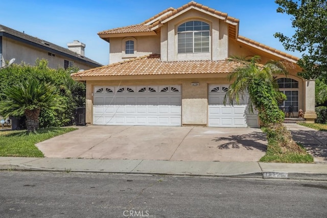 14226 Remington Ct, Fontana, CA 92336 - view of front of house with stucco siding, concrete driveway, and a tiled roof