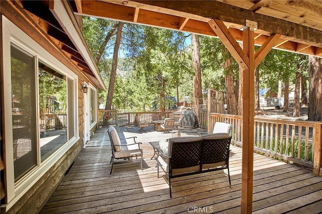 41394 Valley Of The Falls Dr, Forest Falls, CA 92339 - wooden terrace featuring an outdoor living space and view of scattered trees