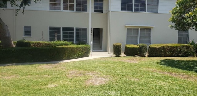 4131 Perlita Ave Unit B, Los Angeles, CA 90039 - property entrance with stucco siding and a lawn