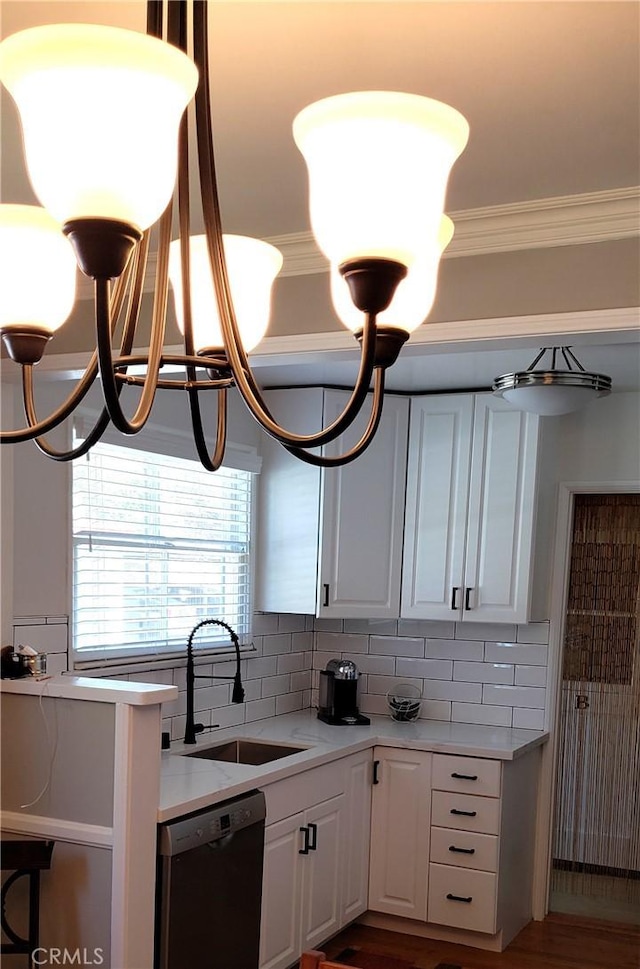 4131 Perlita Ave Unit B, Los Angeles, CA 90039 - kitchen featuring dishwasher, a chandelier, decorative backsplash, white cabinetry, and light countertops