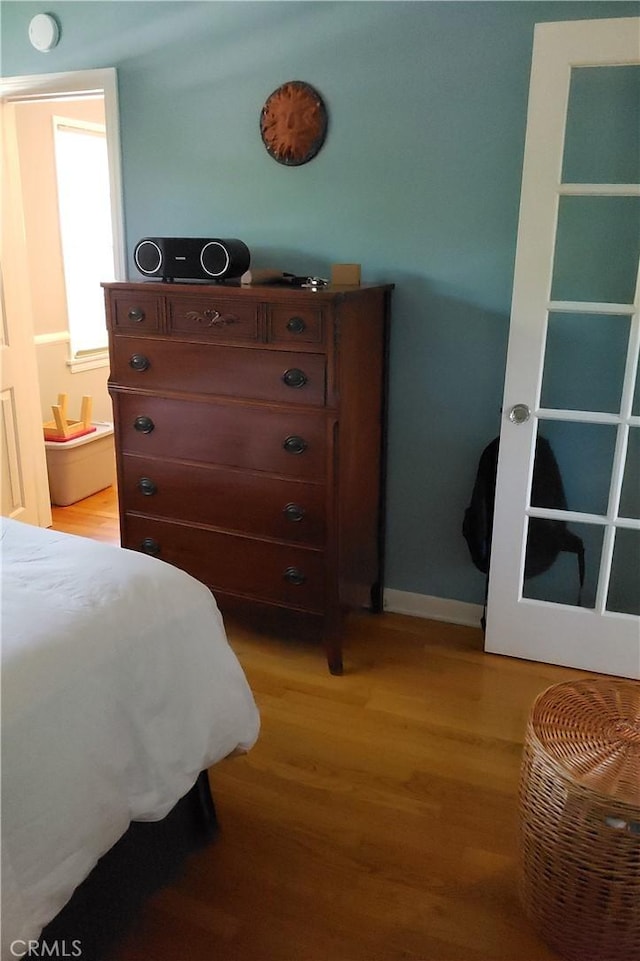 4131 Perlita Ave Unit B, Los Angeles, CA 90039 - bedroom with light wood-style flooring and baseboards