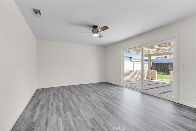24933 Dracaea Ave, Moreno Valley, CA 92553 - empty room with a ceiling fan and wood finished floors