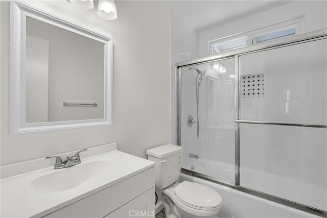 24933 Dracaea Ave, Moreno Valley, CA 92553 - bathroom with vanity and combined bath / shower with glass door