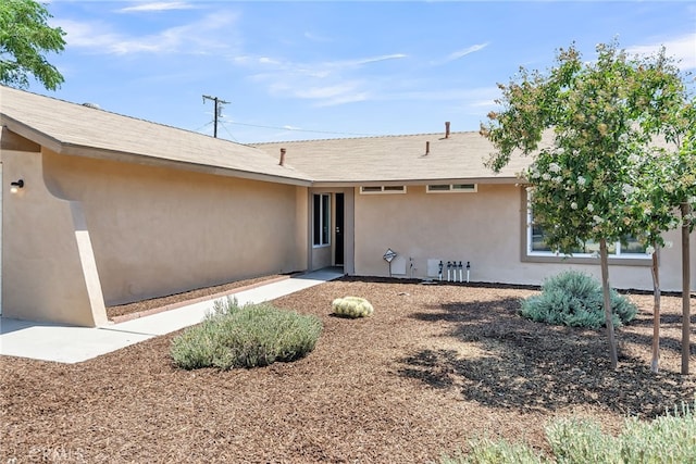 24933 Dracaea Ave, Moreno Valley, CA 92553 - view of exterior entry featuring stucco siding