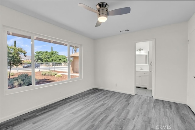 24933 Dracaea Ave, Moreno Valley, CA 92553 - spare room featuring light wood-type flooring and a ceiling fan