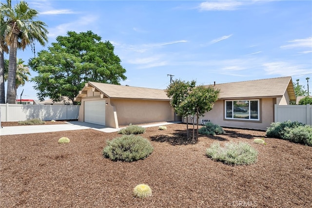 24933 Dracaea Ave, Moreno Valley, CA 92553 - single story home featuring stucco siding, a garage, driveway, and roof with shingles