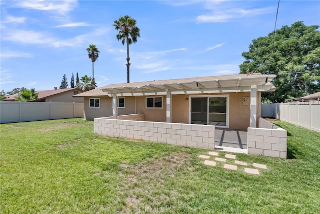 24933 Dracaea Ave, Moreno Valley, CA 92553 - rear view of house featuring stucco siding, a pergola, a fenced backyard, and a patio area