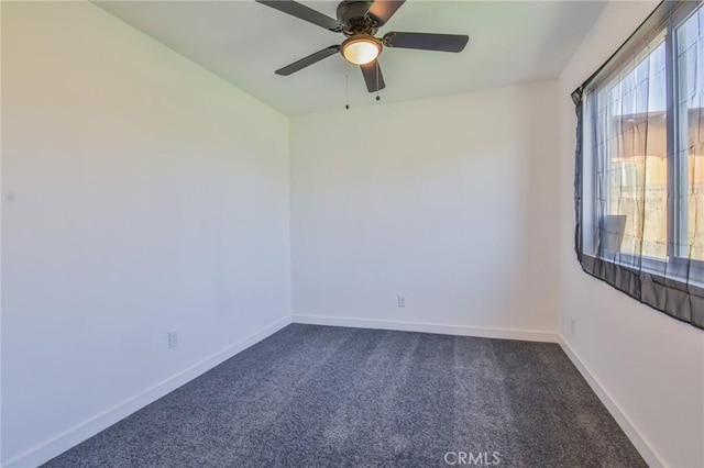 1026 W 109th St, Los Angeles, CA 90044 - spare room with dark colored carpet and a ceiling fan