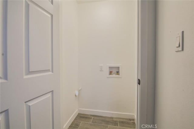 1026 W 109th St, Los Angeles, CA 90044 - laundry area featuring washer hookup and wood tiled floors