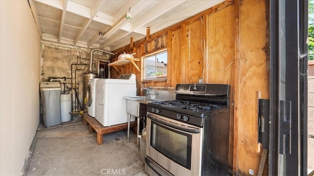 3139 W 152nd Pl, Gardena, CA 90249 - kitchen with gas range and unfinished concrete floors