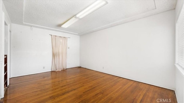 3139 W 152nd Pl, Gardena, CA 90249 - empty room featuring wood finished floors and a textured ceiling
