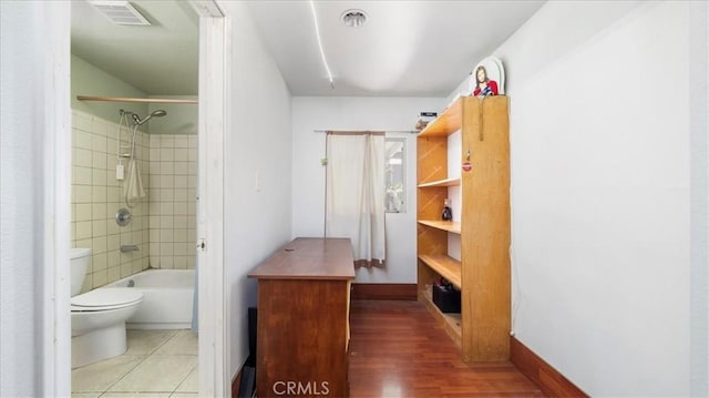 3139 W 152nd Pl, Gardena, CA 90249 - bathroom with tub / shower combination and wood finished floors