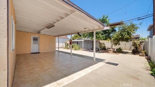 3139 W 152nd Pl, Gardena, CA 90249 - fenced backyard with an attached carport, a shed, and a patio area