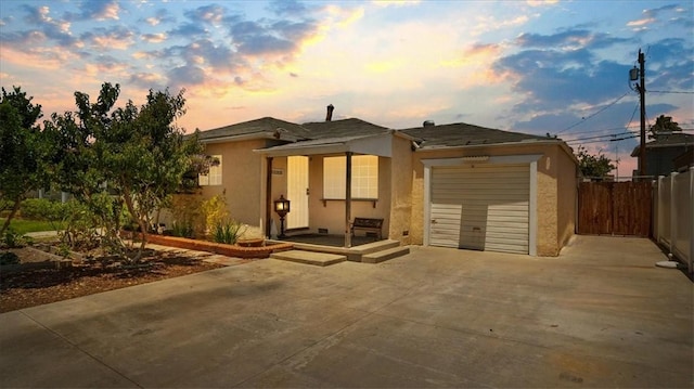 3139 W 152nd Pl, Gardena, CA 90249 - view of front of house with an attached garage, driveway, and stucco siding