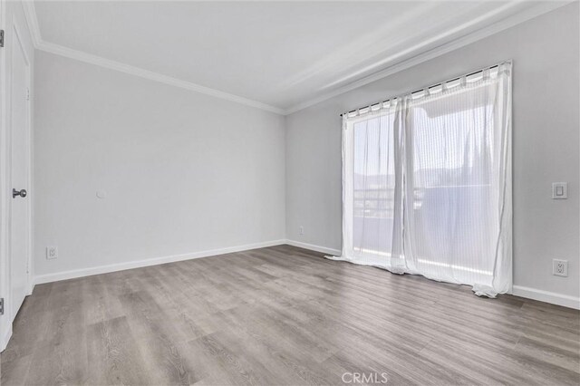250 W Spazier Ave Unit 209, Burbank, CA 91502 - empty room featuring ornamental molding and wood finished floors